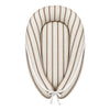 Syrup Sticks lounge pod with warm brown stripes and natural white cotton tie on white background